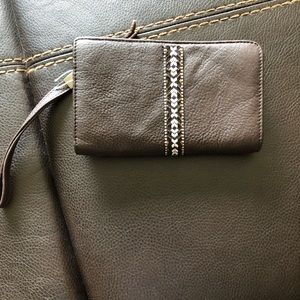 Leather wristlet by Annette Ferber